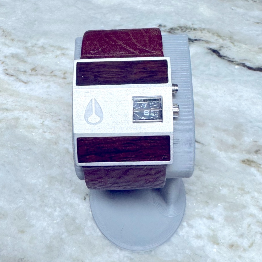 Nixon Rotolog.  Brown leather band